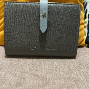 CELINE  Medium strap wallet in bicolor grained calfskin